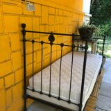 Ancient wrought iron bed
