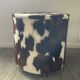 Pouf coffre en peau de vache des années 70