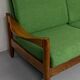 Living room sofa and Scandinavian design armchairs from the 1960s in green boucle.
