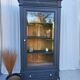 Black and raw wood dresser