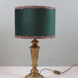 Vintage brass table lamp with green velvet shade.
