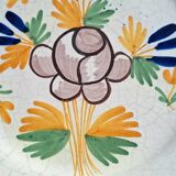 Earthenware plate with floral decoration