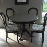 Table with extension cord and 4 chairs in cherry wood