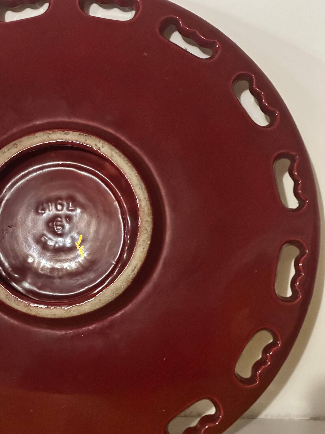 Burgundy and gold openwork plate in ceramic from Saint-Clement, 1950s.