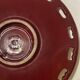 Burgundy and gold openwork plate in ceramic from Saint-Clement, 1950s.