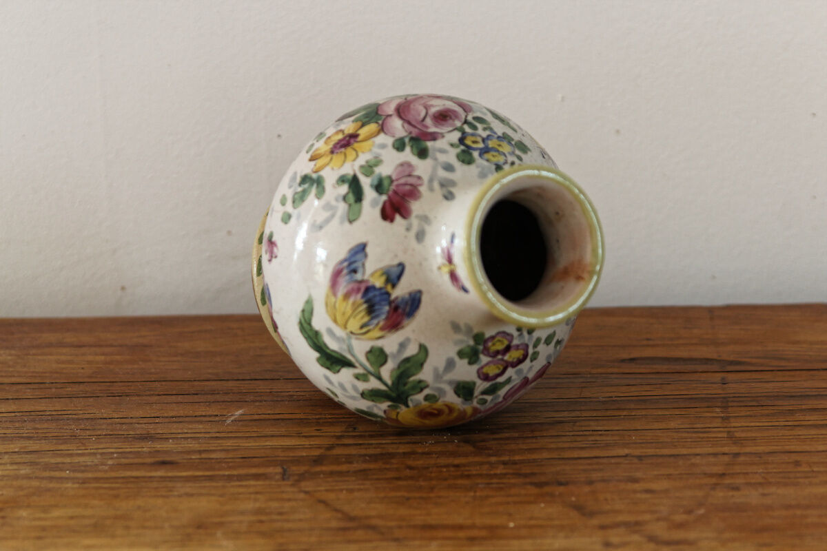 Earthenware ball vase, signed Veuve Perrin
