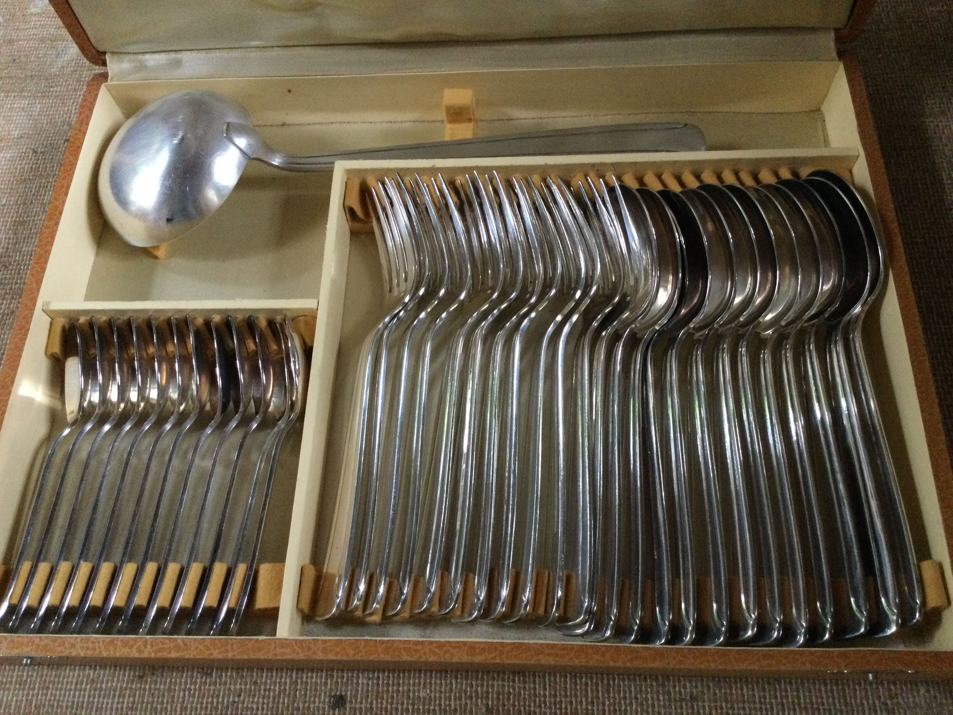 Old housewife in silver metal