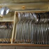 Old housewife in silver metal