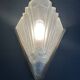 Pair of Art Deco wall sconces in molded glass and gilt brass, 1930