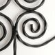 Twisted wrought iron wall coat rack with three hooks