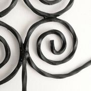 Twisted wrought iron wall coat rack with three hooks