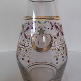 Antique golden carafe with colorful patterns
