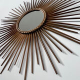 Old sun mirror in gold metal design from the 60s Chaty Vallauris