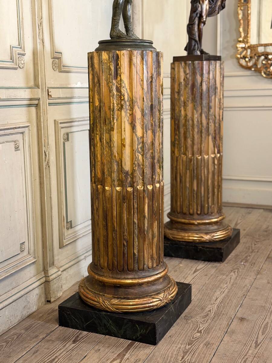 Pair of carved wooden columns in the Louis XVI style, The Crystal Staircase, circa 1880.