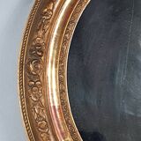 Antique oval mirror with original stucco and gilt wood frame, 37x31 cm. Beautiful patina.