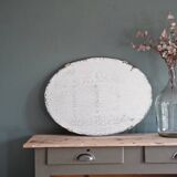 Antique oval bevelled mirror