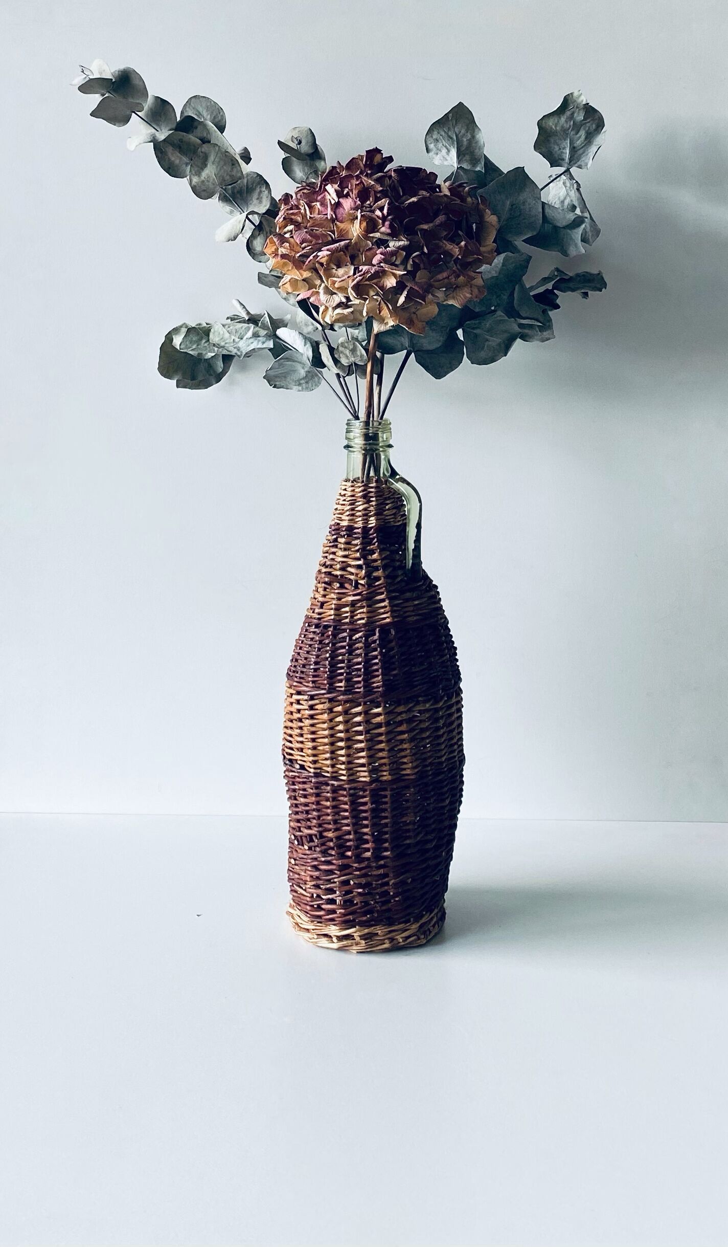 Vintage bottle with wicker