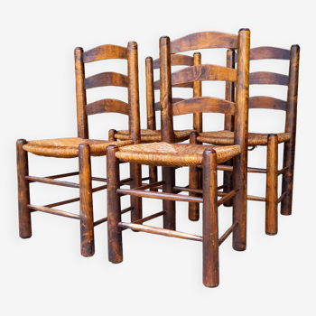 Set of 4 straw-covered brutalist chairs by George Robert