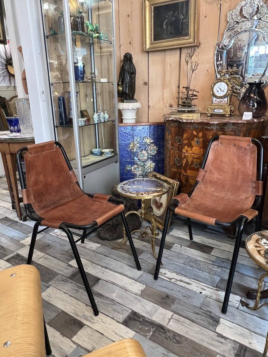 Pair of Metal and Leather Chairs, after Charlotte Perriand for Les Arcs, circa 1960.