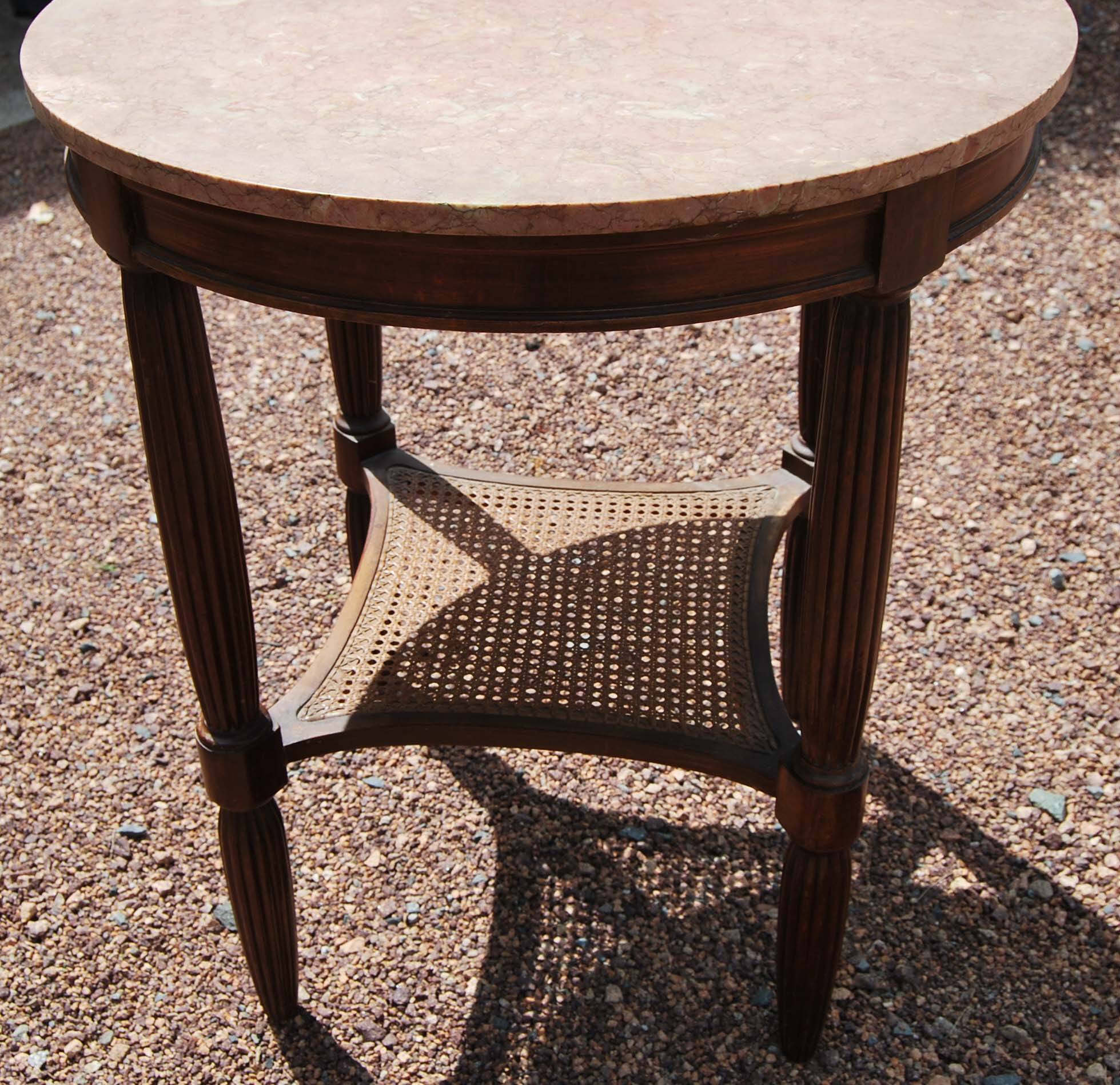 Old art deco style pedestal table with pink marble top