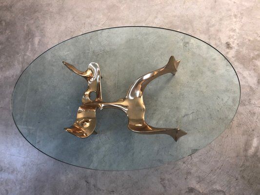 Bronze and glass coffee table with female sculpture by Victor Roman