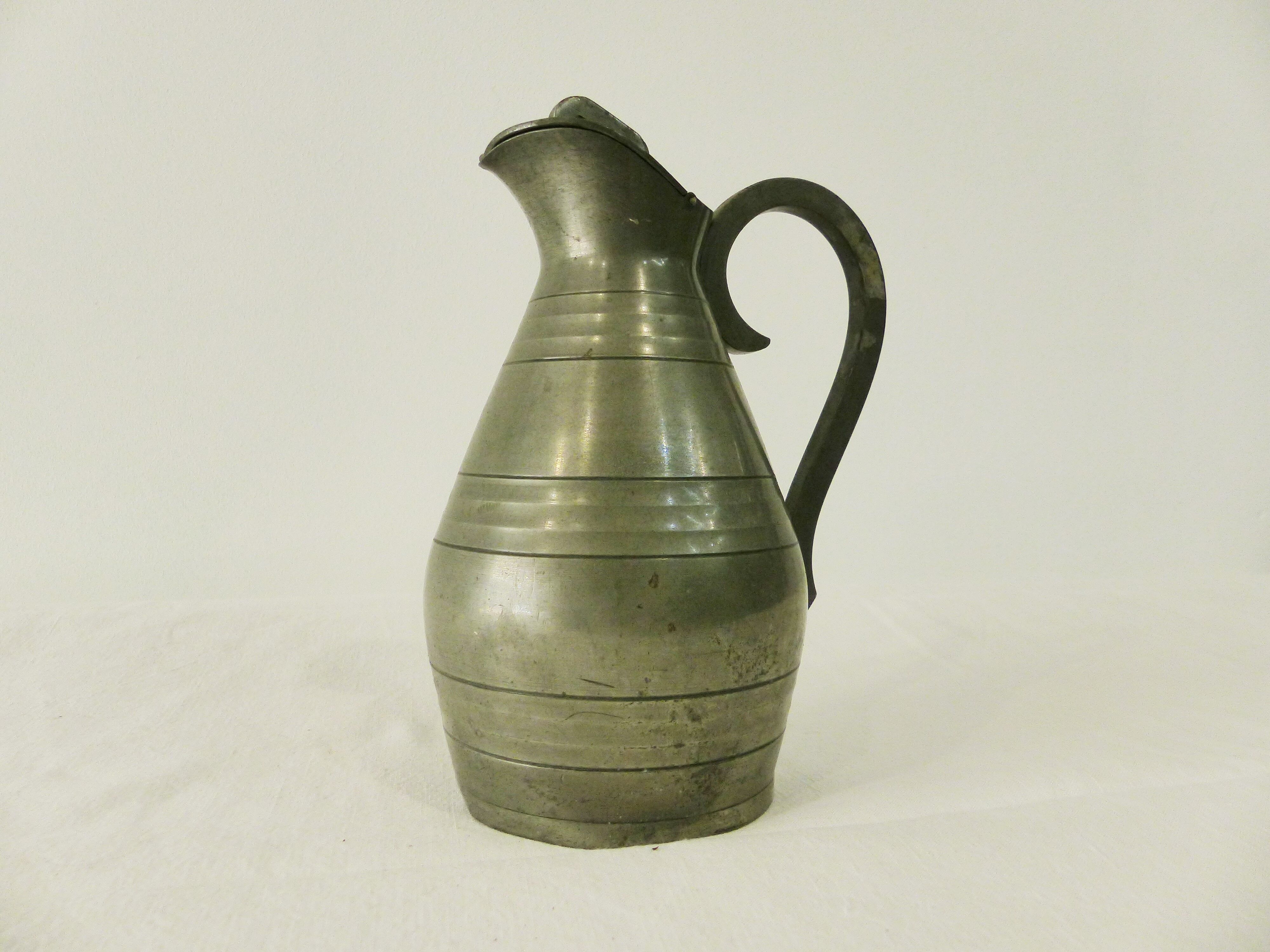Tin pitcher by J.Despres 20th century