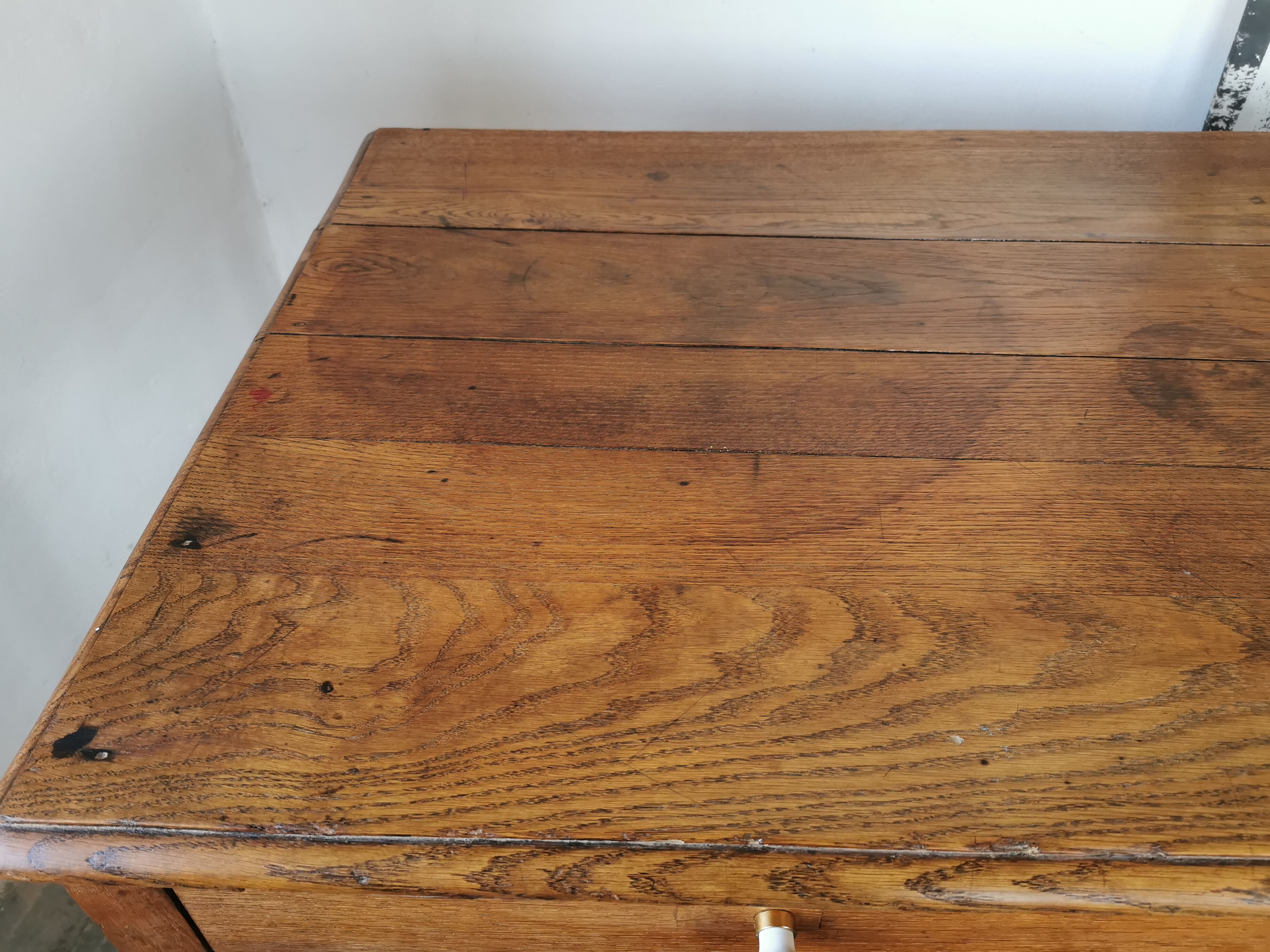 Table in raw oak, countryside.