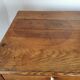 Table in raw oak, countryside.