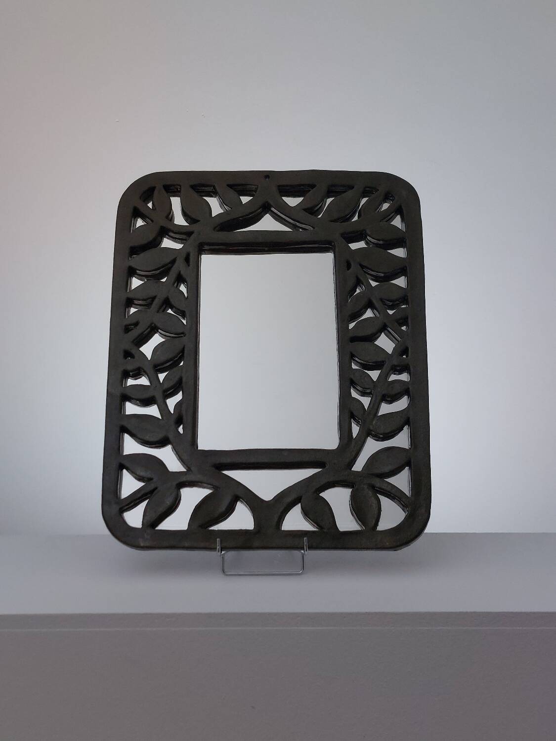 Unique vintage floral ceramic wall mirror by an artist