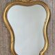 Gilded wooden mirror assembly and its wall console