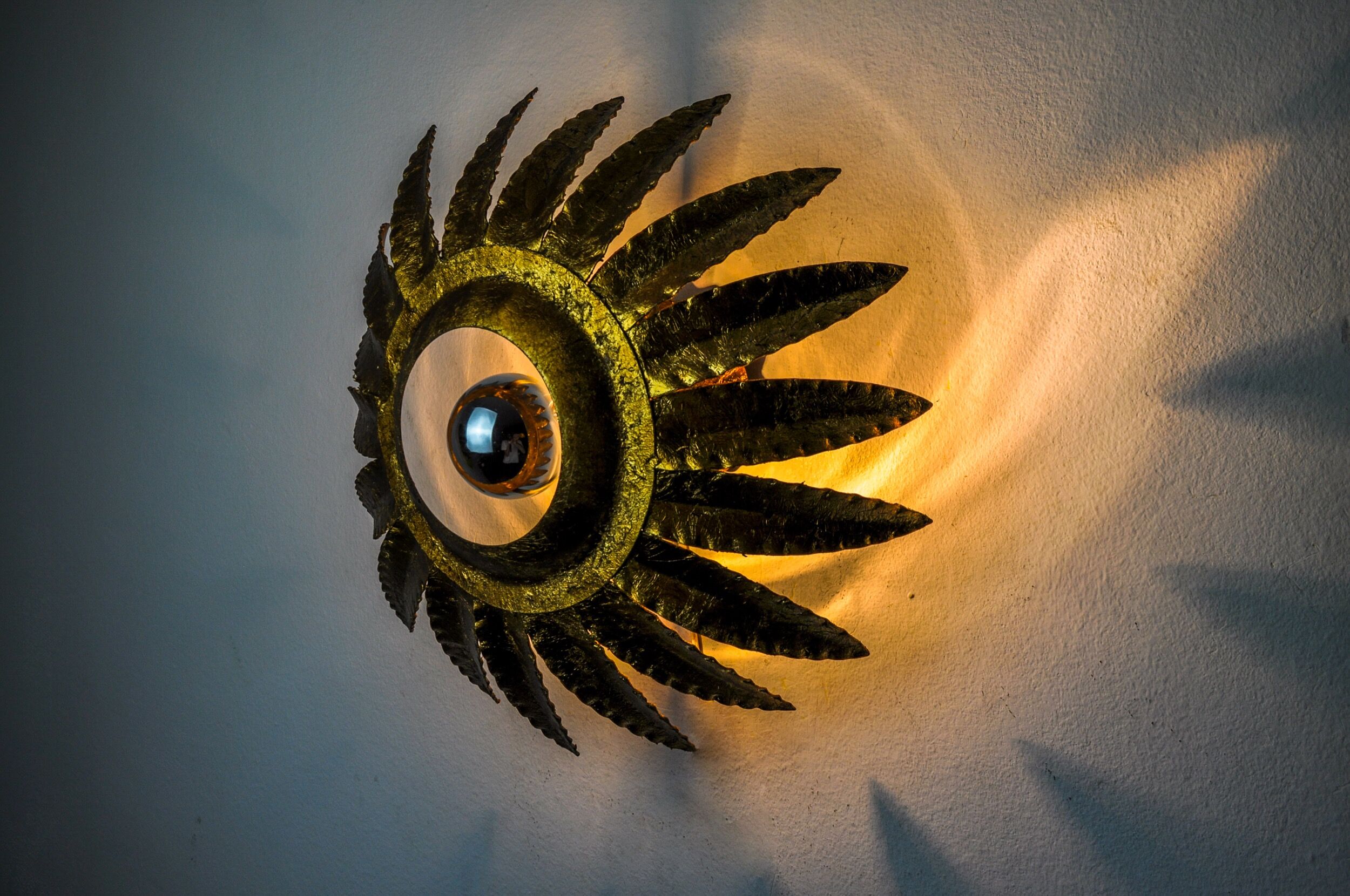 Sun wall lamp by ferro arte, metal and gold leaf, Spain, 1960