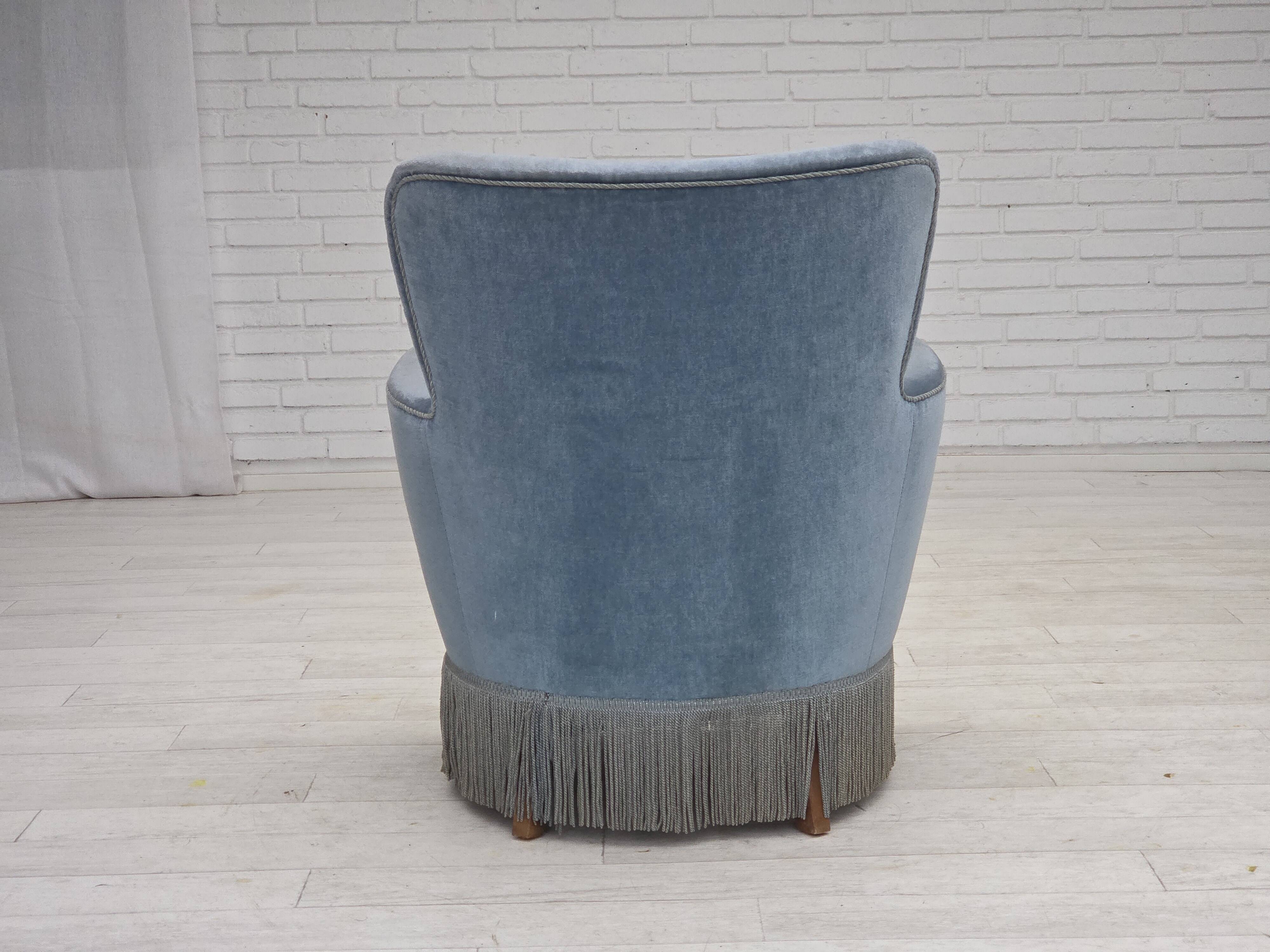 1970s, Danish armchair with footstool, blue furniture velour, oak wood legs