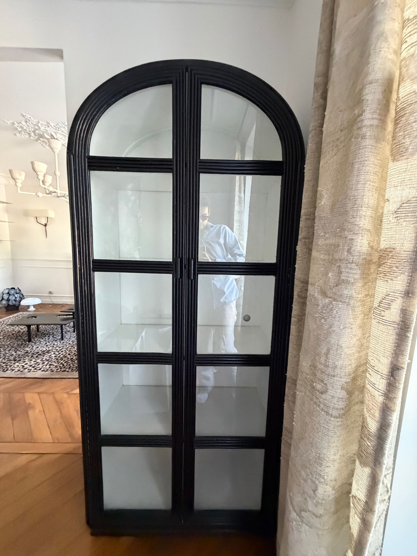 Black woven wood display cabinet