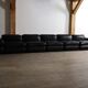 Modular sofa in black leather by Rodolfo Bonetto for Tecnosalotto, 1960s