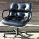 POLLOCK black leather reclining armchair with casters