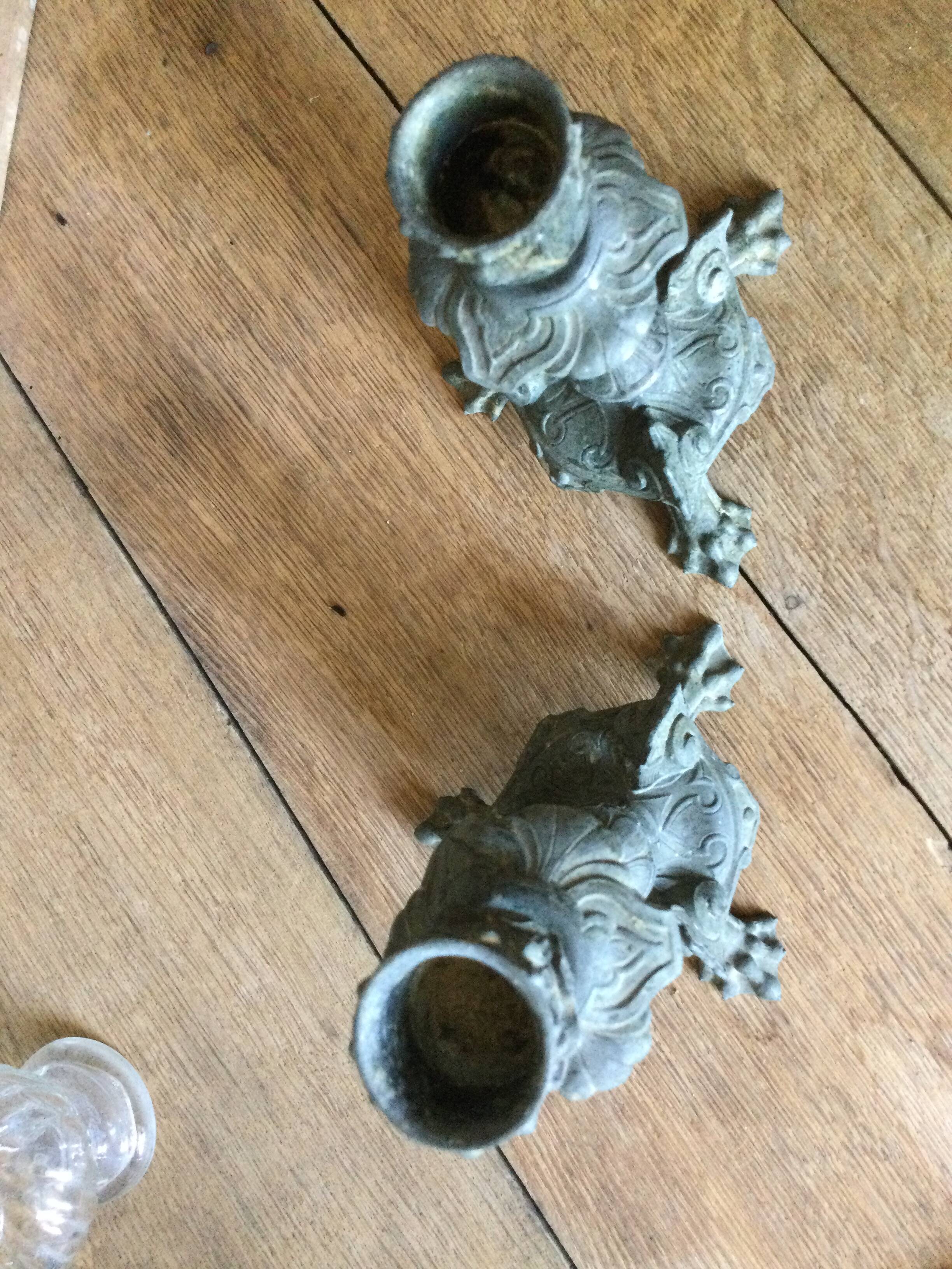 Set of 2 antique candlesticks in spelter.