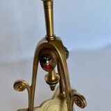 Pair of bronze tripod candlesticks,