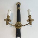 Pair of black lacquered bronze wall sconces decorated with lion heads