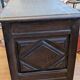 Antique dark wood chest with geometric paneling / pointed detail