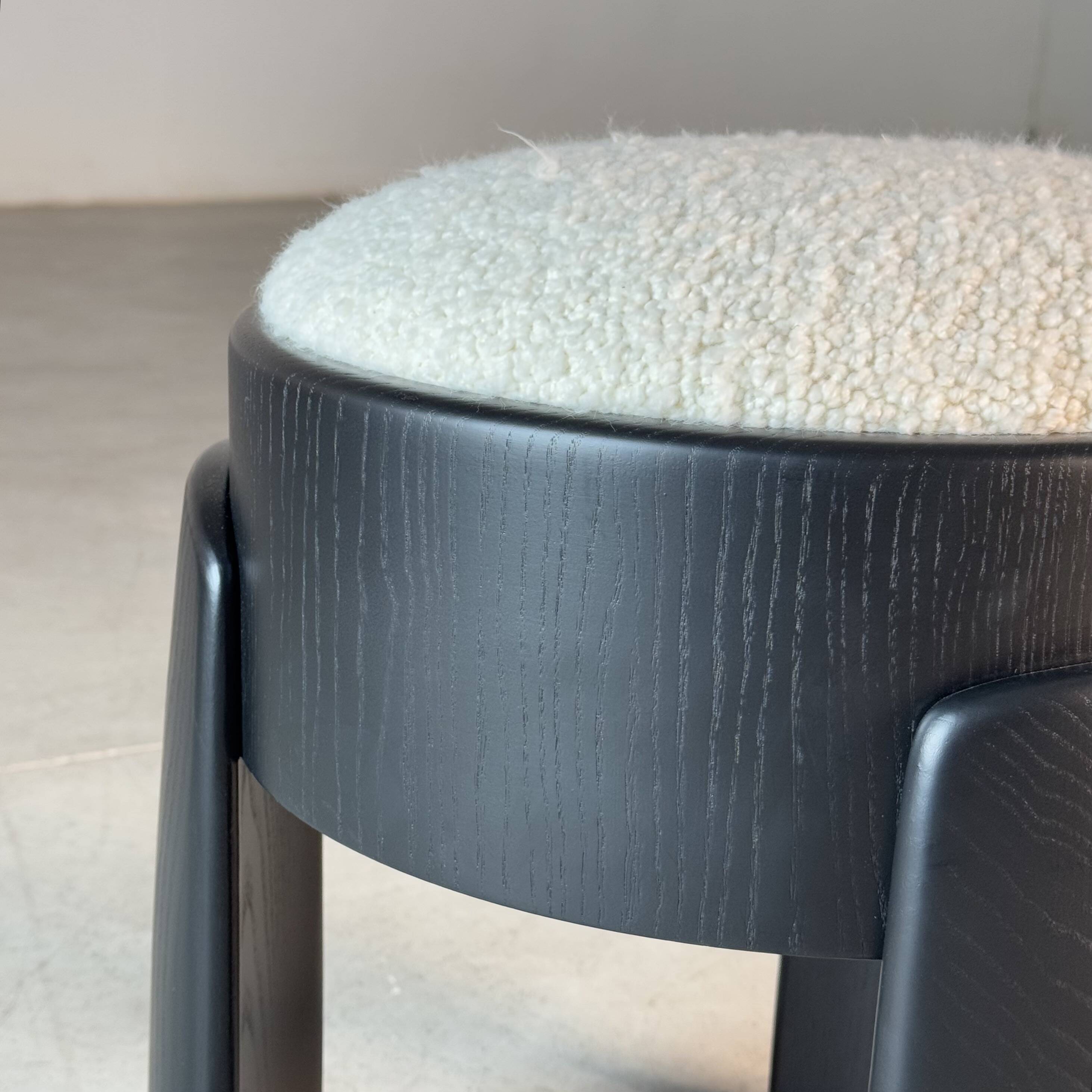 Sculptural Black Ash Wood Stool with Dedar Milano Bouclé Ivory by FORME