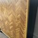 Bar cabinet with chevron installation