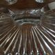 Three-pointed glass candlestick
