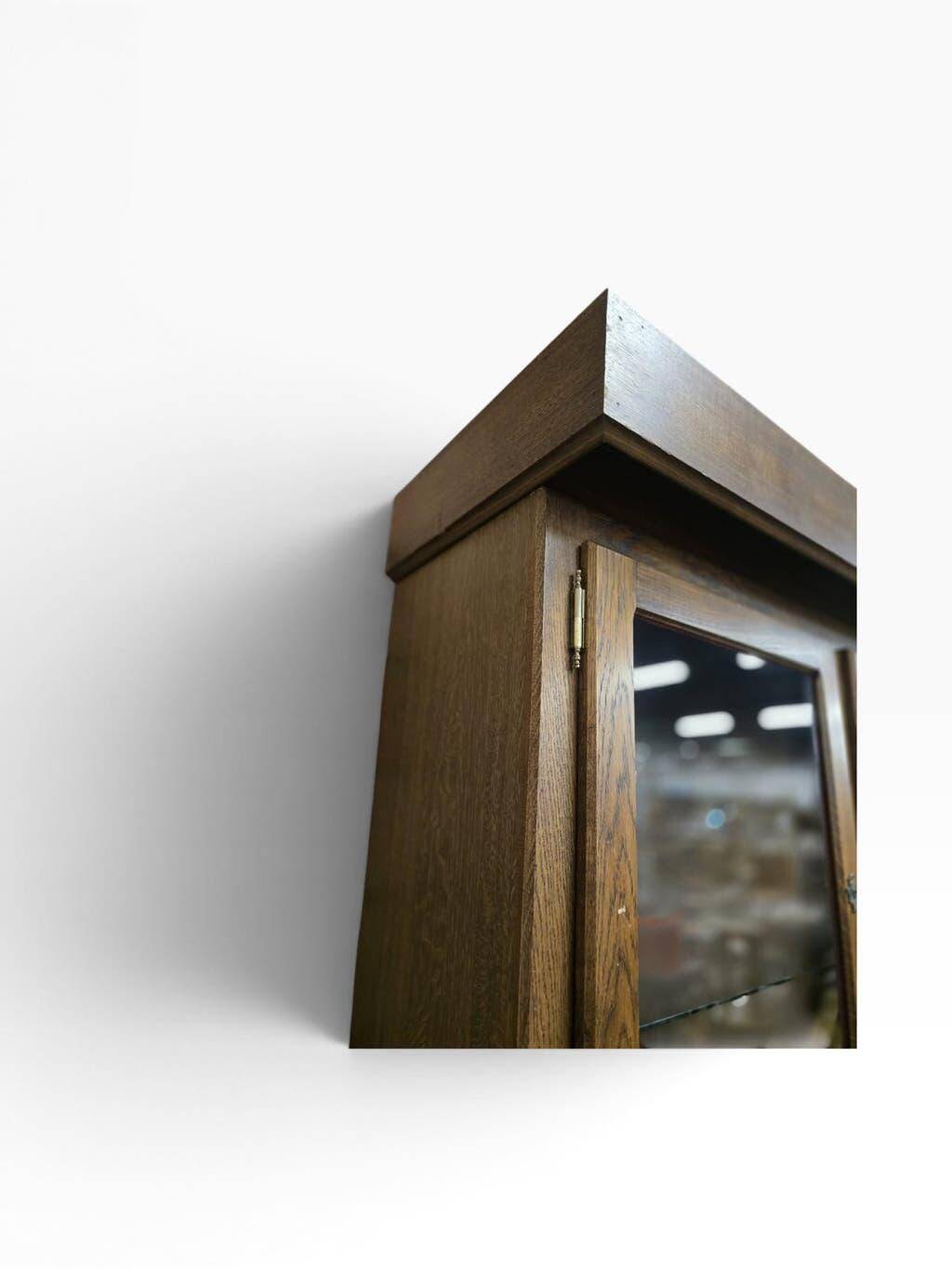 Robust vintage wooden display cabinet
