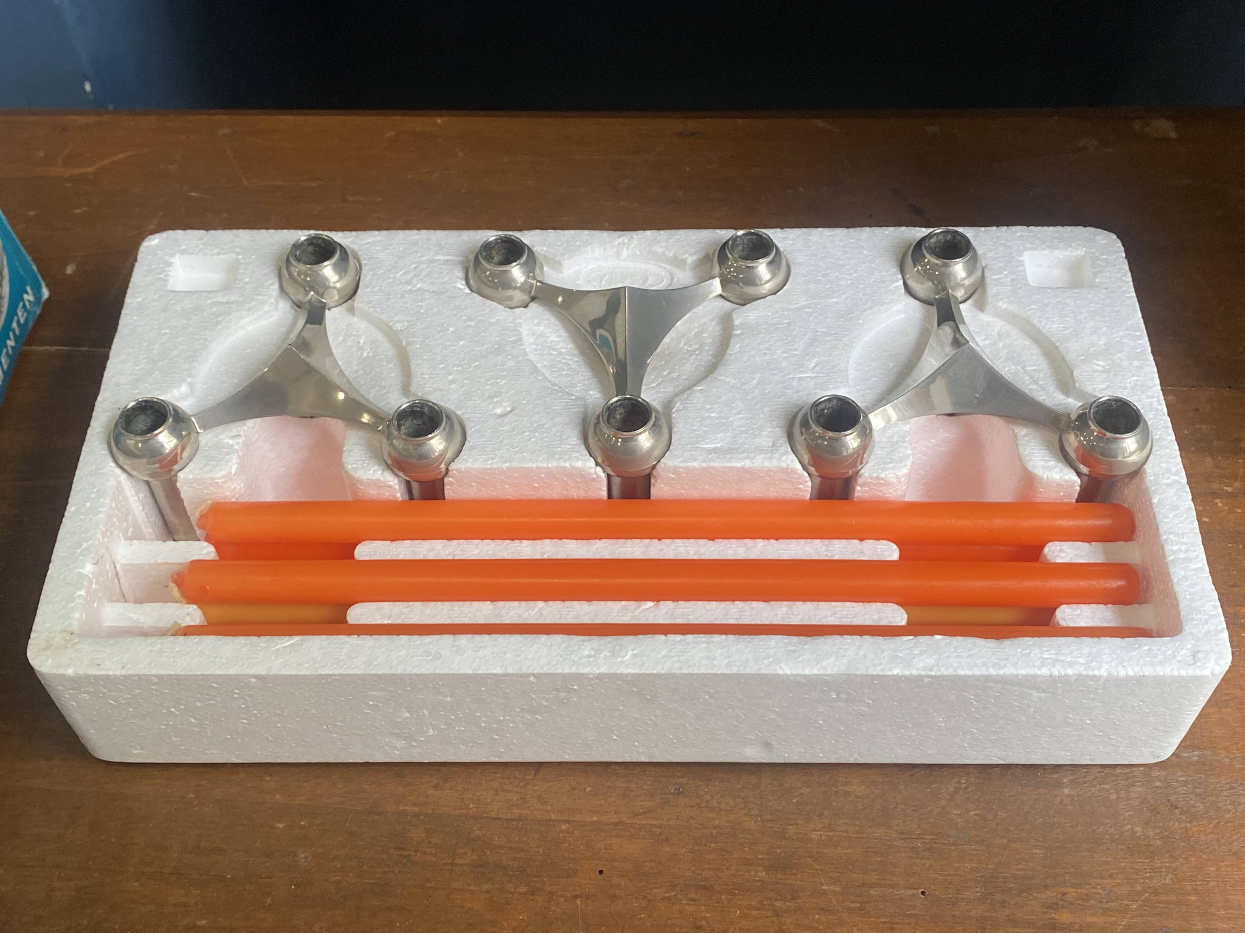 Set of 3 S22 candle holders and 9 vintage 1970 NAGEL modular candles in box.
