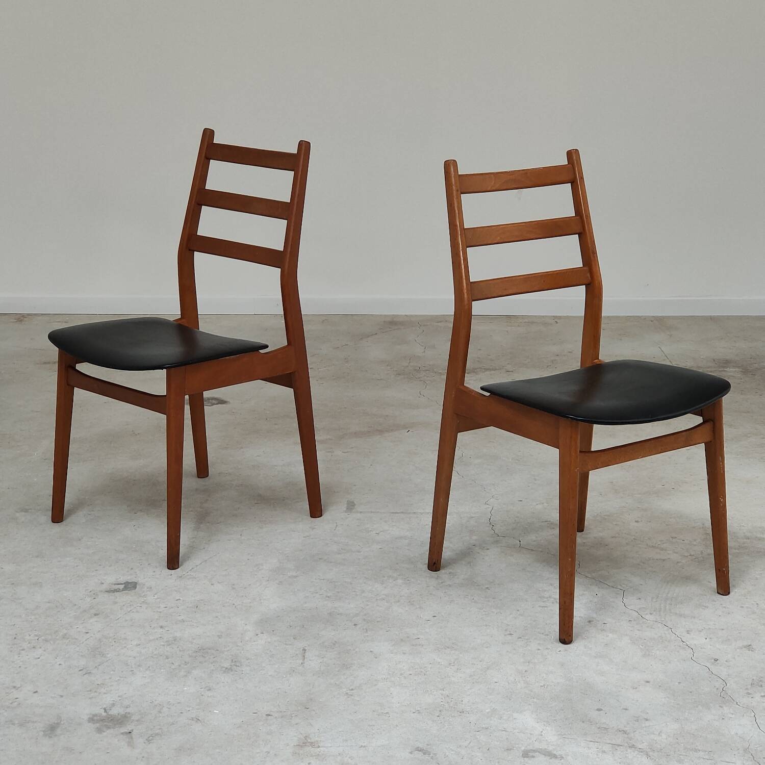 Pair of Scandinavian style leather and wood chairs 1970