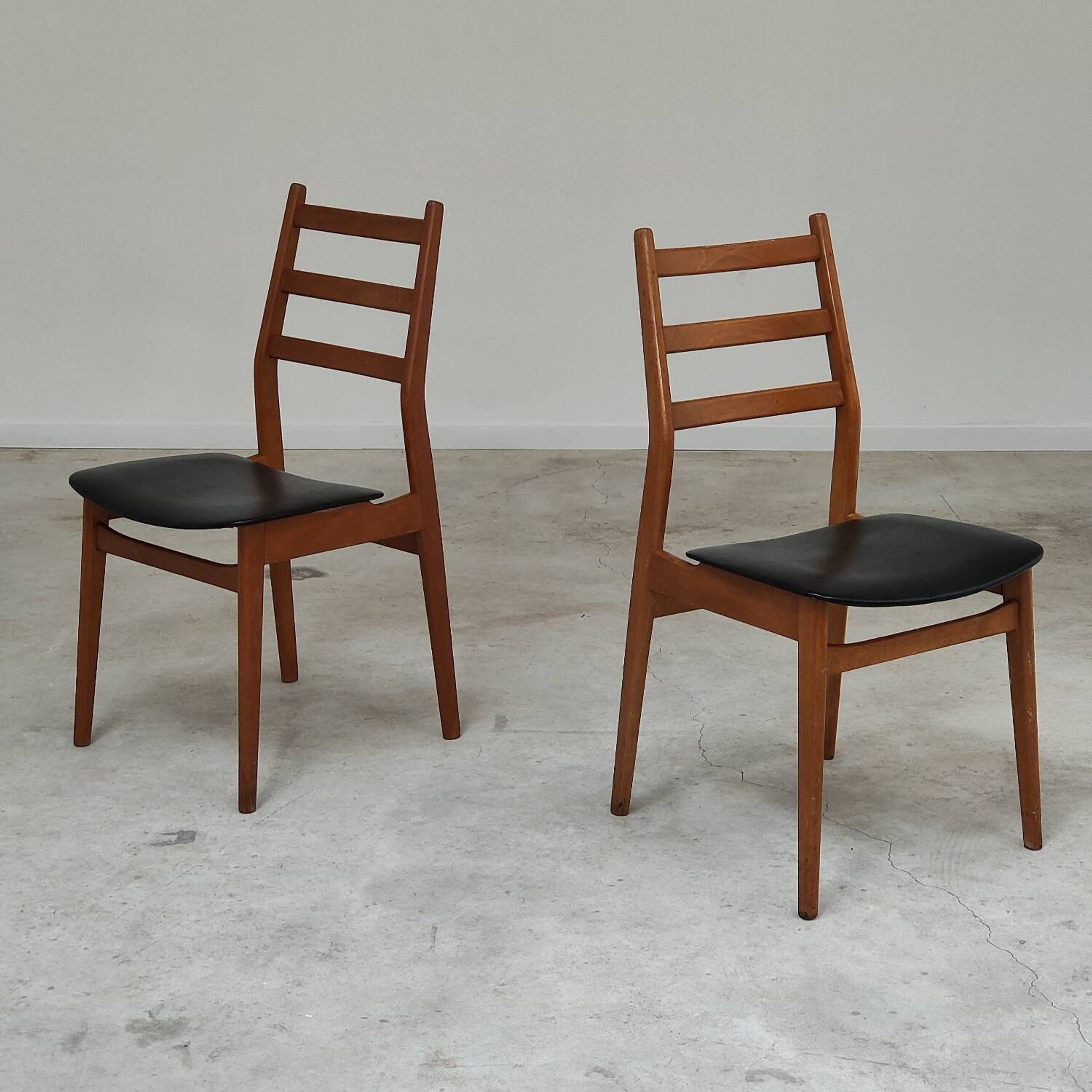 Pair of Scandinavian style leather and wood chairs 1970
