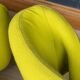 A 20thC RIBBON CHAIR & FOOTSTALL BY PIERRE PAULIN FOR ARTIFORT, FRANCE