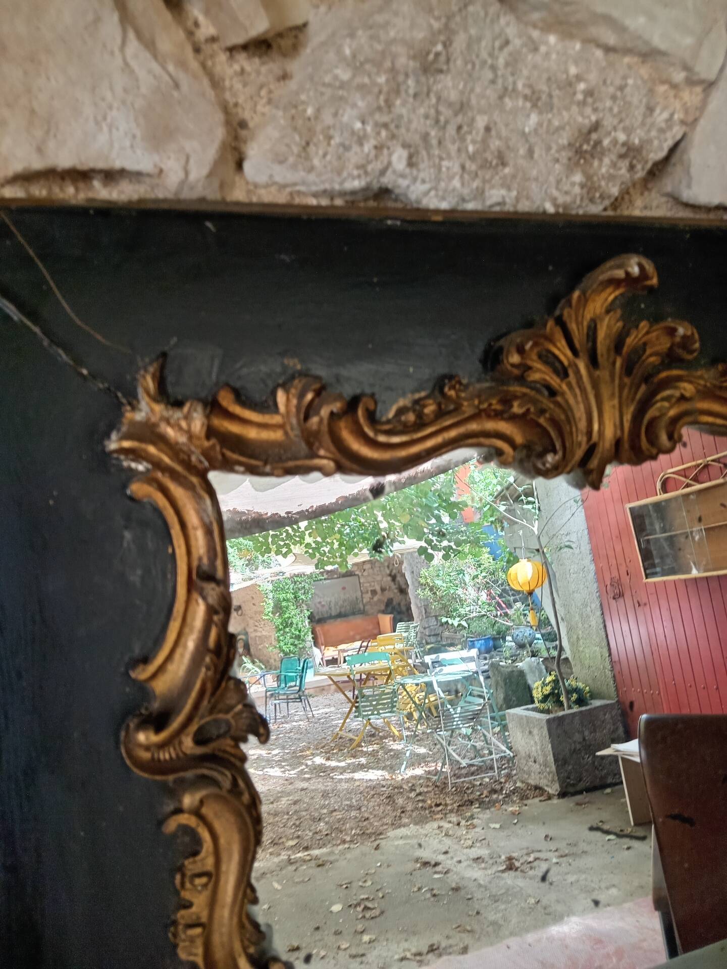 Antique mirror in stucco and wood