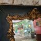 Antique mirror in stucco and wood