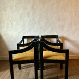 Four designer armchairs